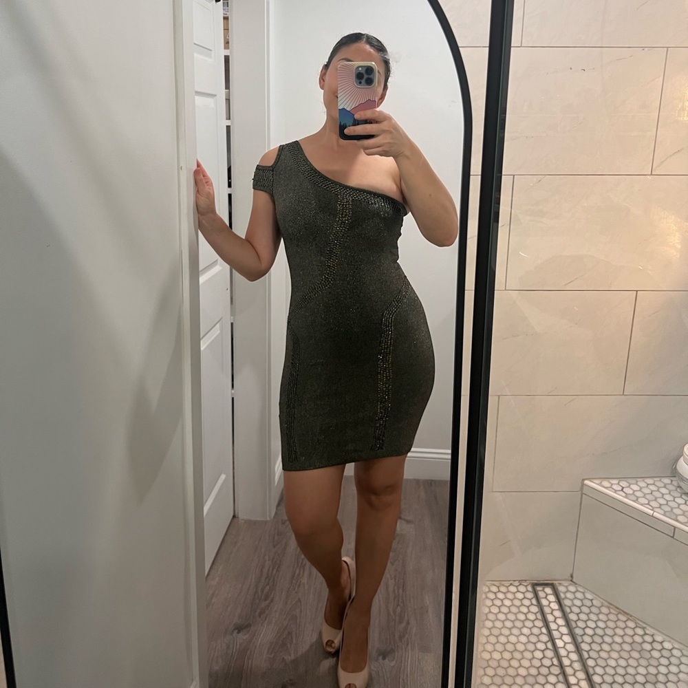 Bebe One-Shoulder gold Bodycon Dress with sequin details.